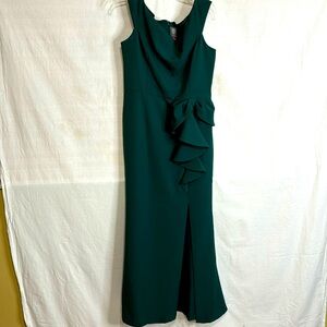 Beautiful evening gown. Bow accent at waist with slit at above knee